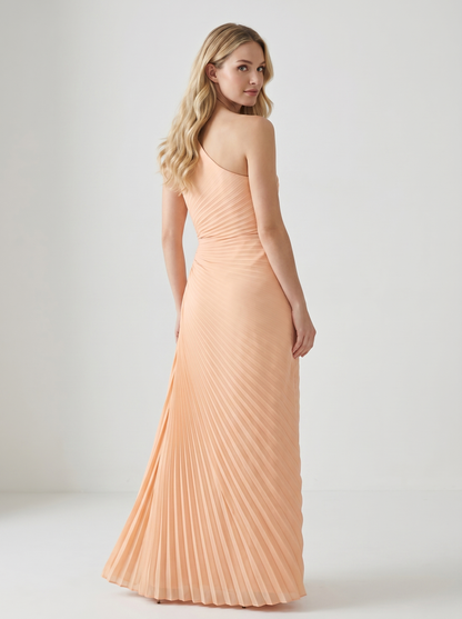 Apricot one-shoulder pleated maxi dress, back view showing bare shoulder and full-length skirt