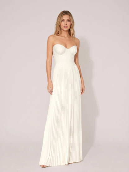 White strapless pleated wedding guest maxi dress with structured bodice, front view on model