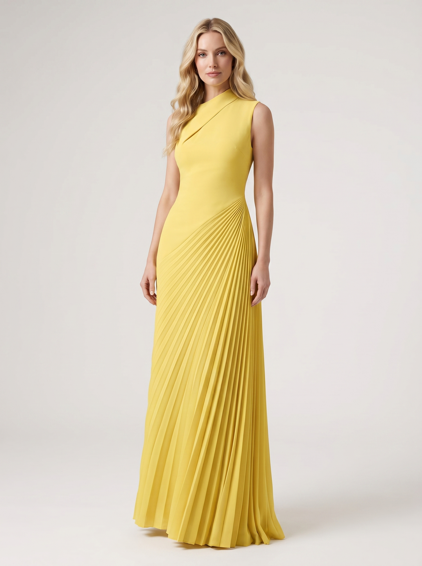 Yellow one-shoulder pleated maxi dress with fitted bodice and diagonal pleats, front view on model