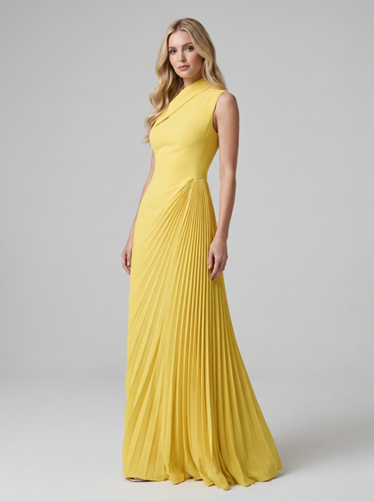 Yellow one-shoulder pleated maxi dress, three-quarter view showing draped pleats and long skirt